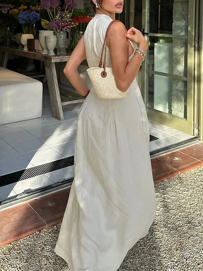 Long dress with zipper, pleated, sleeveless, bodycon, elegant for summer parties, midi length.