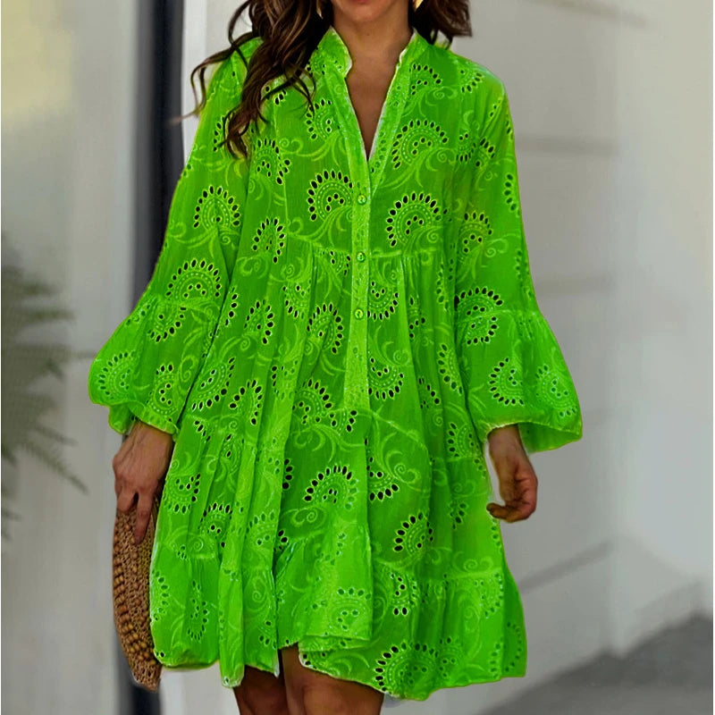 Elegant vintage summer dress in smooth lace with a V-neck, loose fit, and sheer details with embroidery.