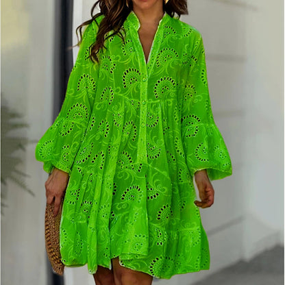 Elegant vintage summer dress in smooth lace with a V-neck, loose fit, and sheer details with embroidery.