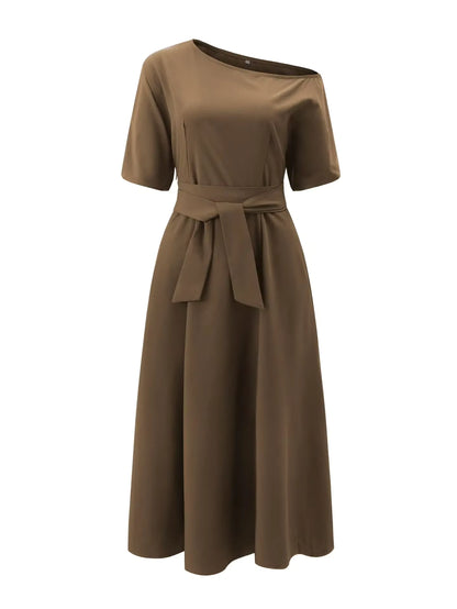 Elegant women's off-the-shoulder midi dress with a flared silhouette, defined waist, and pockets